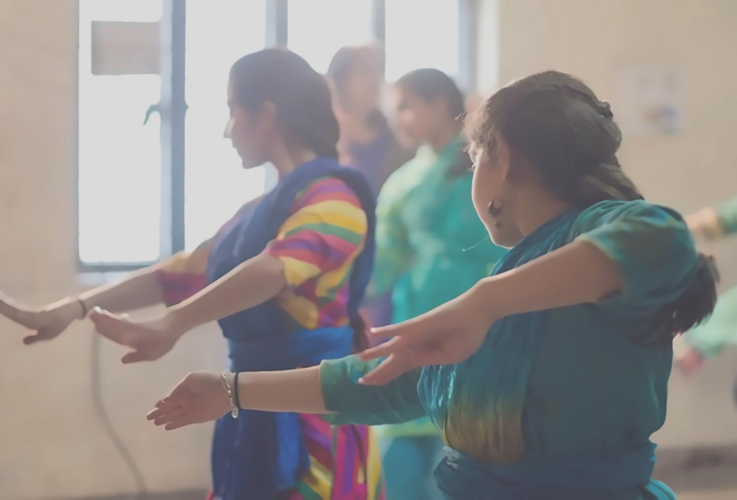 Professional ballroom dancers demonstrating elegant waltz technique in our spacious dance studio